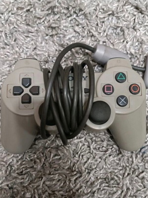 PlayStation 2 controller used, untested