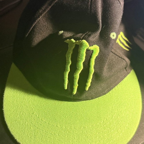 Monster hat like new, black and green