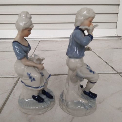 Vintage decorative figurines of boy and girl like new, 19 cm tall