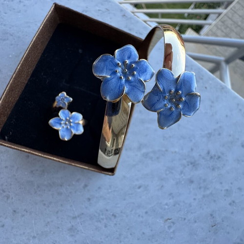 Jewelry set new, summer style with blue and gold flowers