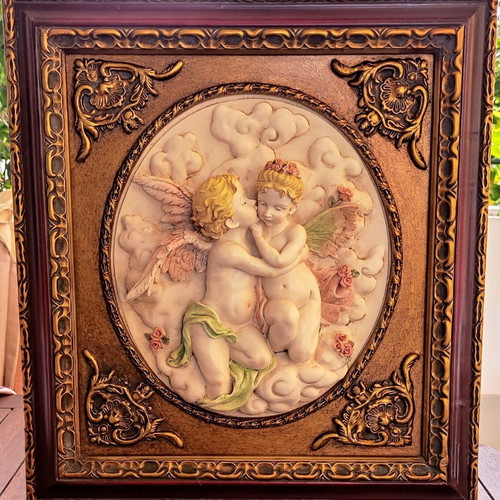 Relief wall art used in ornate frame 56x50cm