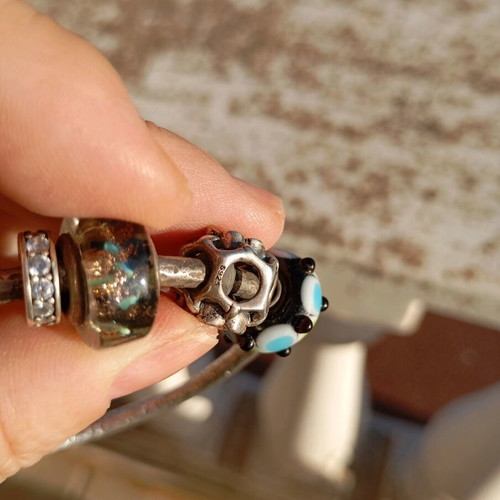 Hammered silver bracelet with Murano charms like new