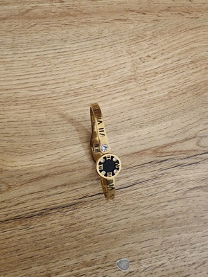 Roman numeral gold plated stainless steel watch bracelet like new