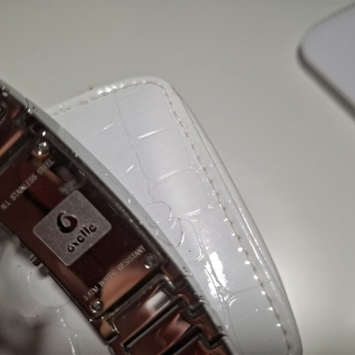 Oxette women's watch used with extra bracelet, silver