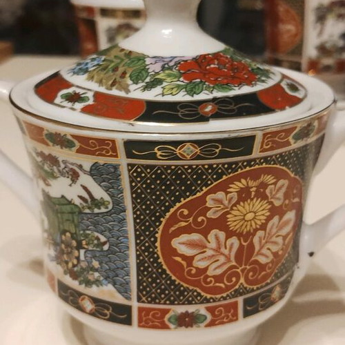 Japanese tea set with 6 cups, sugar bowl and creamer like new