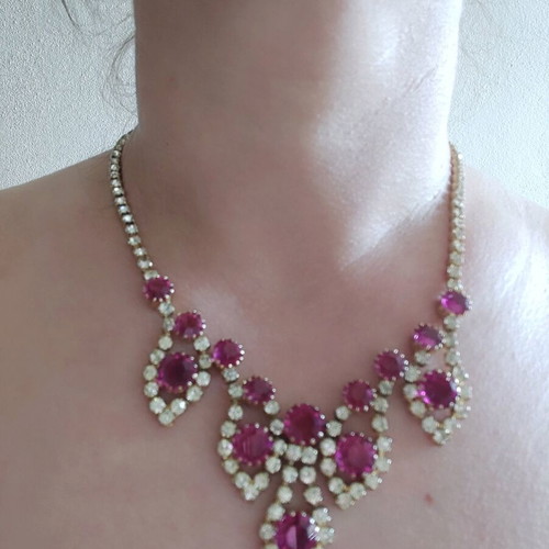 Antique necklace used with pink stones and gold rhinestones