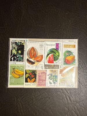 Collection of vintage foreign stamps with fruit and nature themes