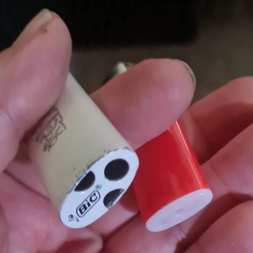 Metallic white mini lighter cases used, BiC type