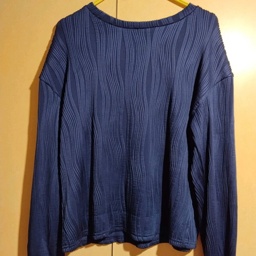 Women's blouse new, blue with embossed patterns, size M