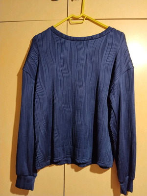 Women's blouse new, blue with embossed patterns, size M