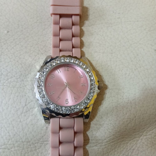 Avon women's watch like new with pink silicone strap and rhinestones
