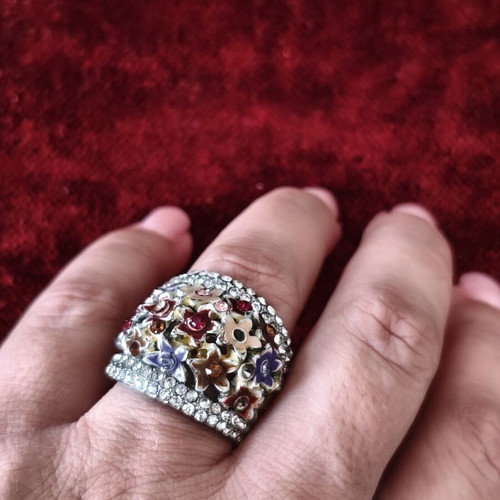 Vintage statement ring used with colorful flowers and rhinestones
