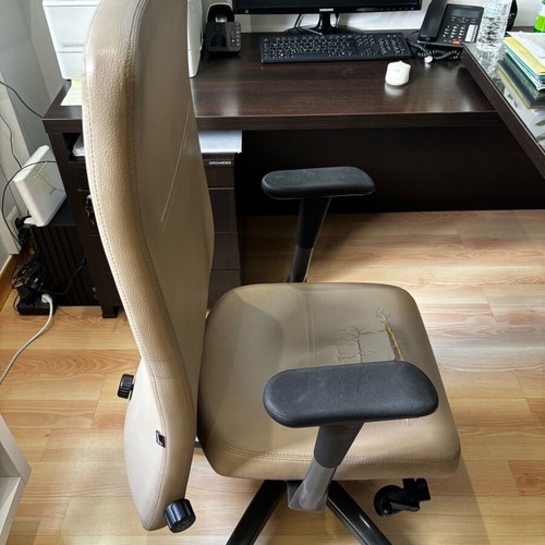 Office chair used, beige leather with wear
