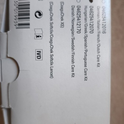 CoaguChek XS System INR meter used with original packaging and accessories