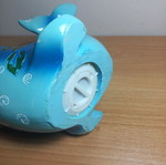 Dolphin piggy bank with designs like new