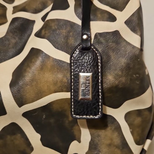 Hunter shoulder bag with giraffe print used