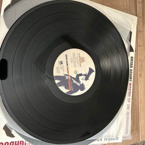 Bryan Adams So Far So Good vinyl used, with poster
