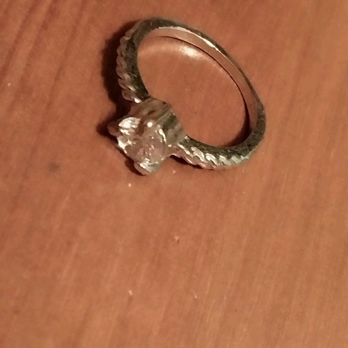 Solitaire ring up to 17mm in like new condition, silver