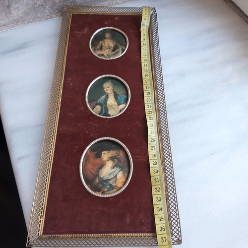 Vintage frame used with velvet and silk portraits of women