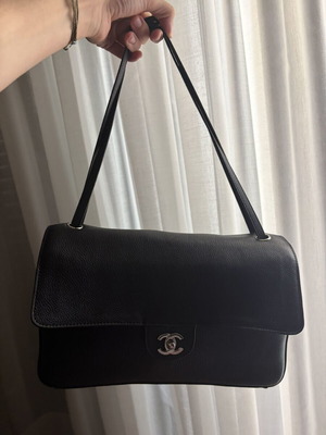 Chanel Maxi Flap Bag black leather used like new