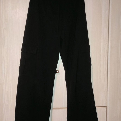 Black cargo pants used, size large