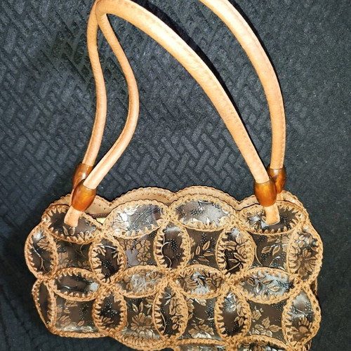 Shoulder bag made of leatherette with circle design like new, brown