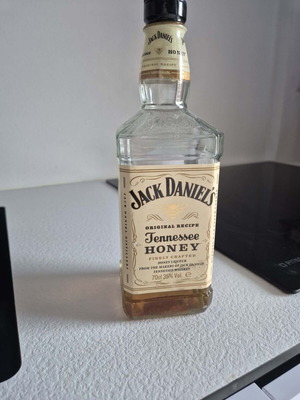 Jack Daniel's Honey Whiskey used, half full
