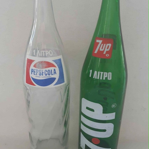Pepsi Cola and 7-Up glass bottles used, set of 2