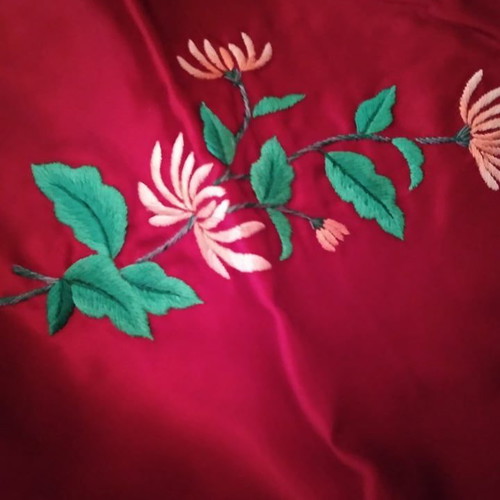 Bed cover used in red with multicolor embroidery and pillowcases