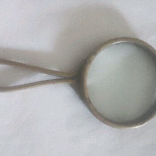 Vintage brass magnifying glass used, 5-inch diameter