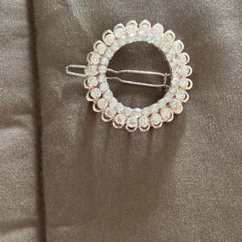 Hair accessory with stones in pink gold color like new