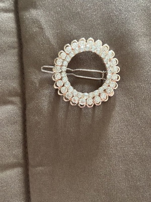 Hair accessory with stones in pink gold color like new