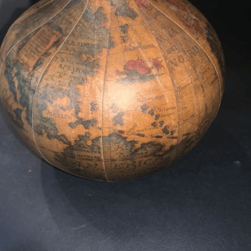 Vintage wine bottle used with Old World map design