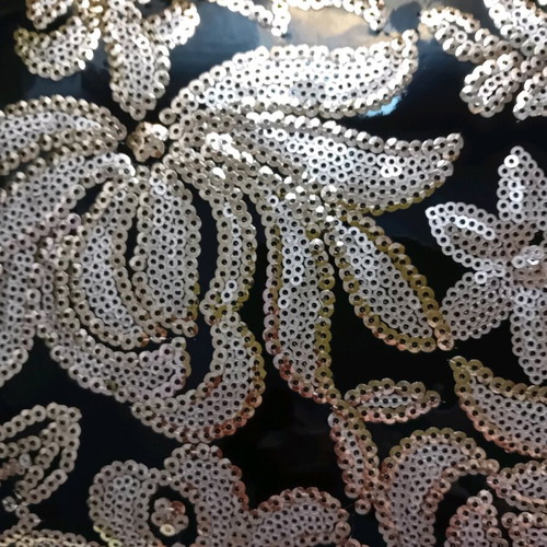 Clutch bag with floral gold sequin embroidery and matching wallet