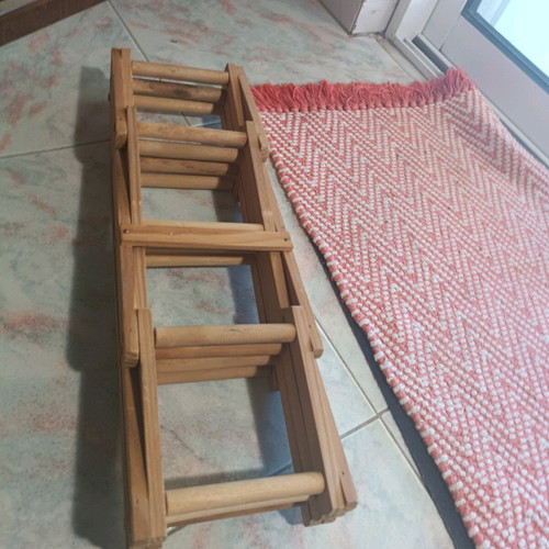 Reclining wooden wine rack used