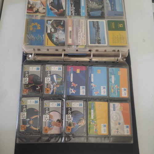Phone Card Album like new with 100 cards of various themes