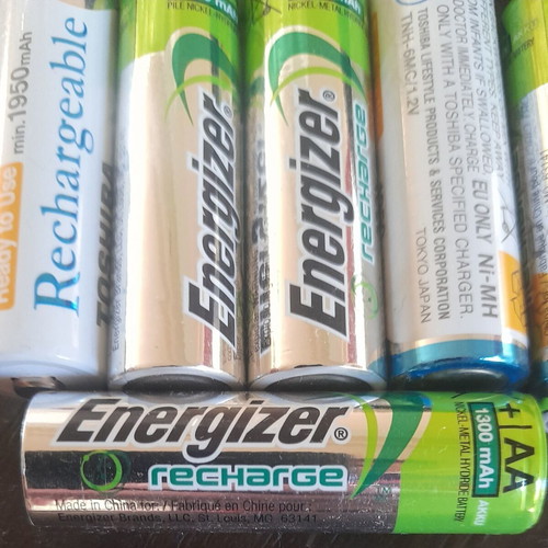 Rechargeable AA batteries with 4-slot charger like new