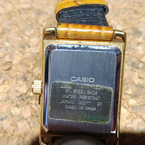 Casio women's watch used with brown leather strap
