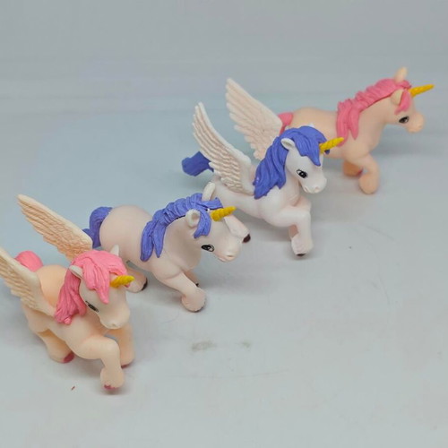 Set of 4 unicorn and pegasus figures like new