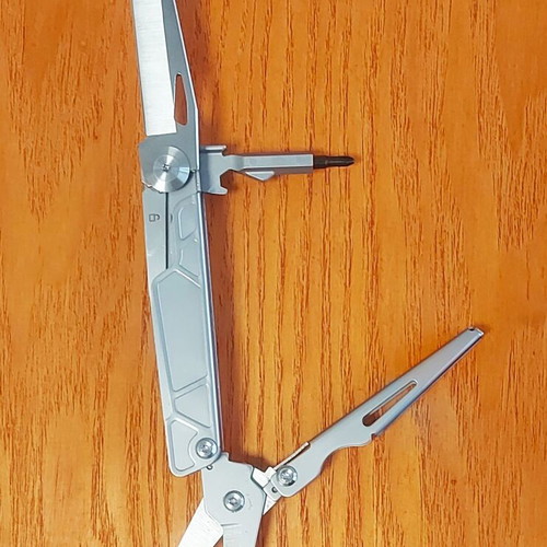 Multitool new with large scissors, knife, and double-tip screwdriver