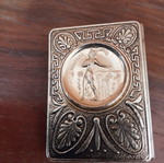 Metal match holder