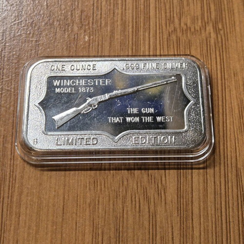 Winchester model 1873 fine silver ounce like new