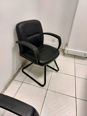 Visitor chair cantilever type, like new, black metal and leather