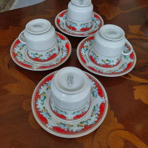Set of 4 cups with saucers like new