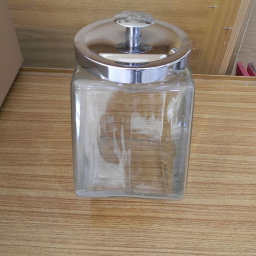 Glass polygon jar with stainless steel lid like new