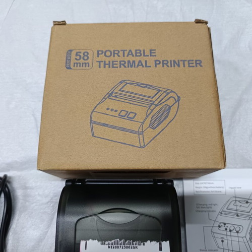 Portable thermal receipt printer
