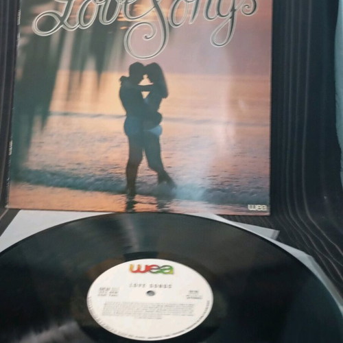 Love Songs vinyl record used in very good condition