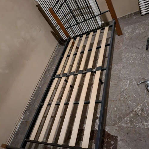 Single bed like new, frame only wood and metal