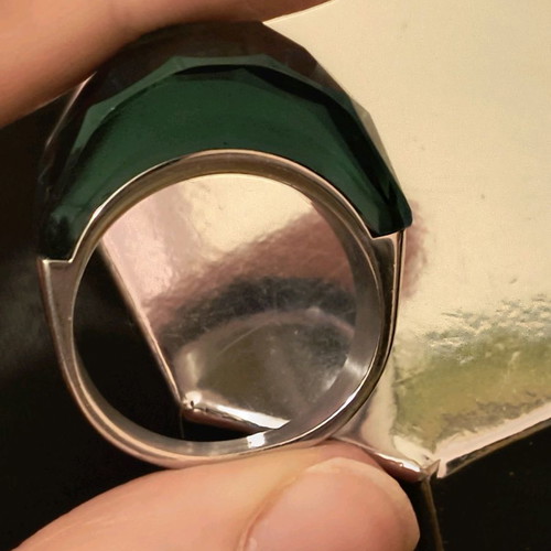 Steel ring used with green glass