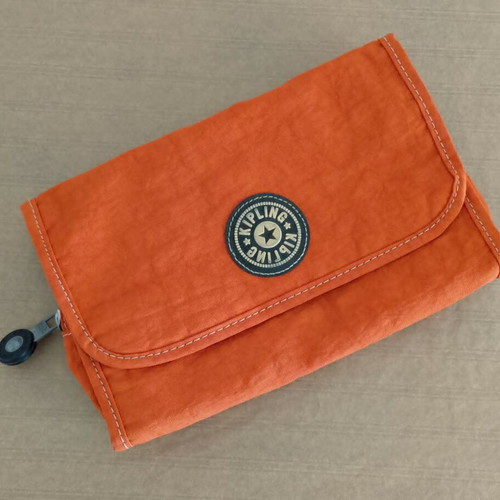 Kipling toiletry bag like new, bright orange